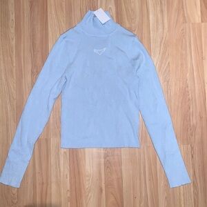 H&M | baby blue mock neck ribbed with heart in front